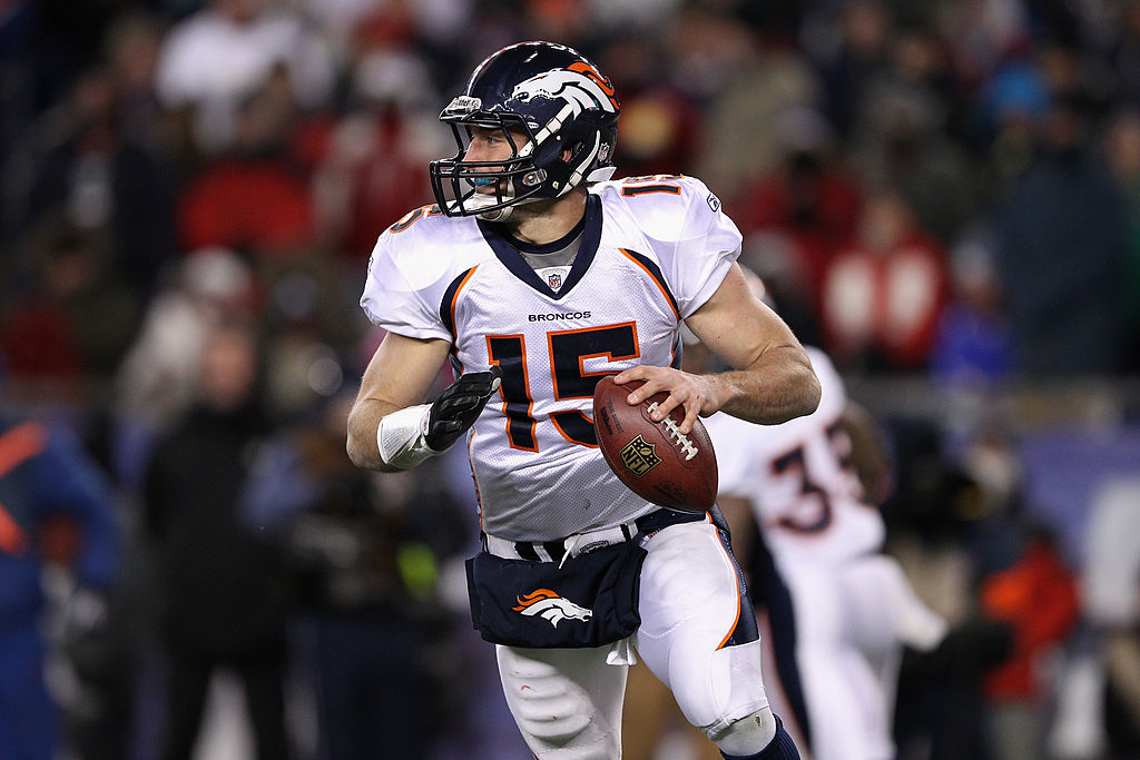FOXBORO, MA - JANUARY 14:  Tim Tebow #15 of the Denver Broncos looks to pass against the New Englan...