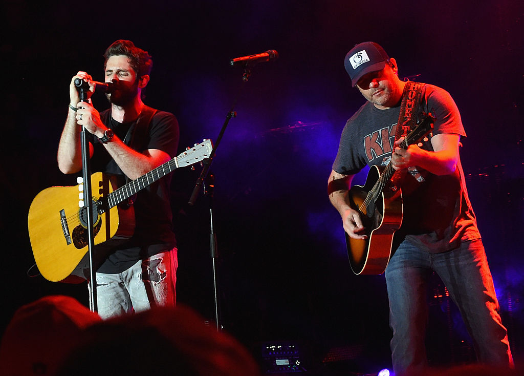 CULLMAN, AL - JUNE 03:  Singer/Songwriter Thomas Rhett is joined on stage by his Dad Singer/Songwri...