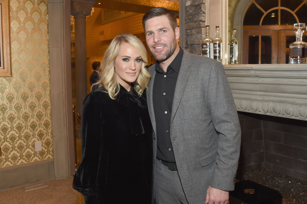 BRENTWOOD, TN - OCTOBER 24:  Singer-songwriter Carrie Underwood (L) and NHL Player Mike Fisher (R) ...