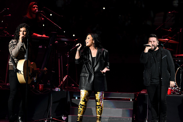 MIAMI, FLORIDA - FEBRUARY 01: (L-R) Dan Smyers, Demi Lovato and Shay Mooney perform onstage during ...