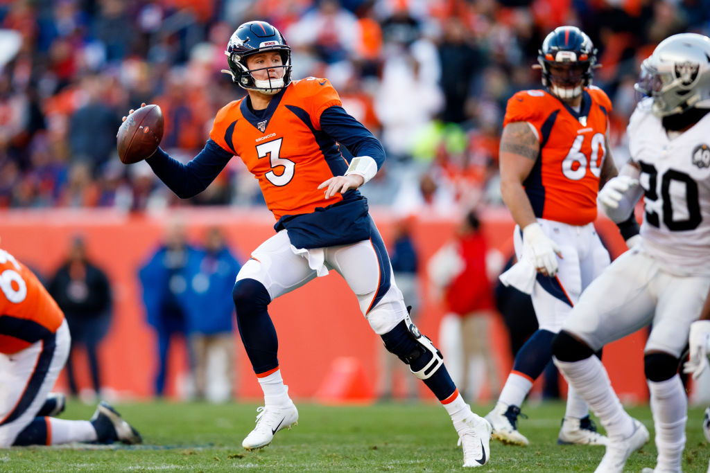 DENVER, CO - DECEMBER 29:  Quarterback Drew Lock #3 of the Denver Broncos looks to pass against the...
