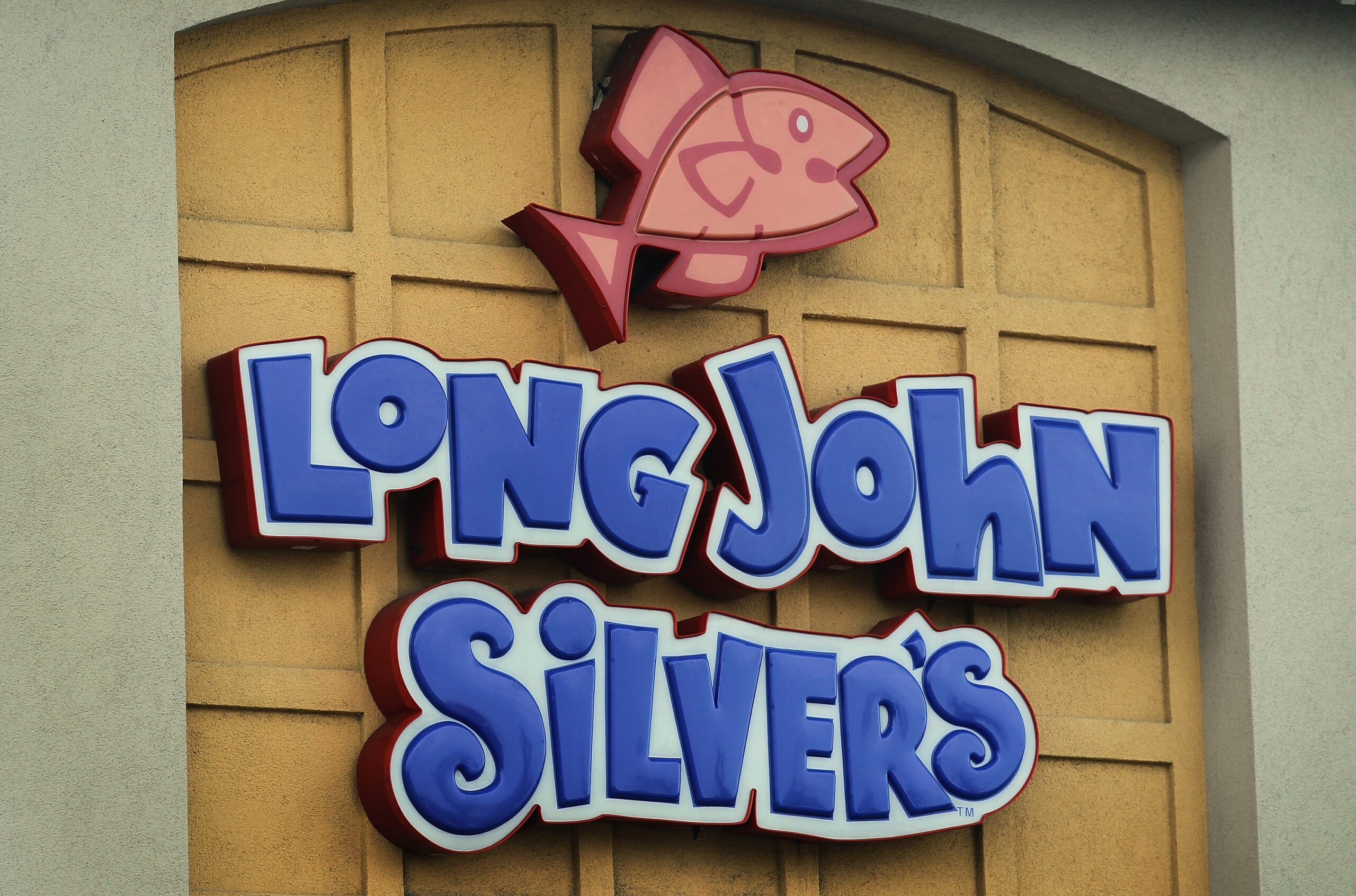 OAK LAWN, IL - SEPTEMBER 22:  A sign hangs above a Yum Brands Long John Silver's restaurant on Sept...