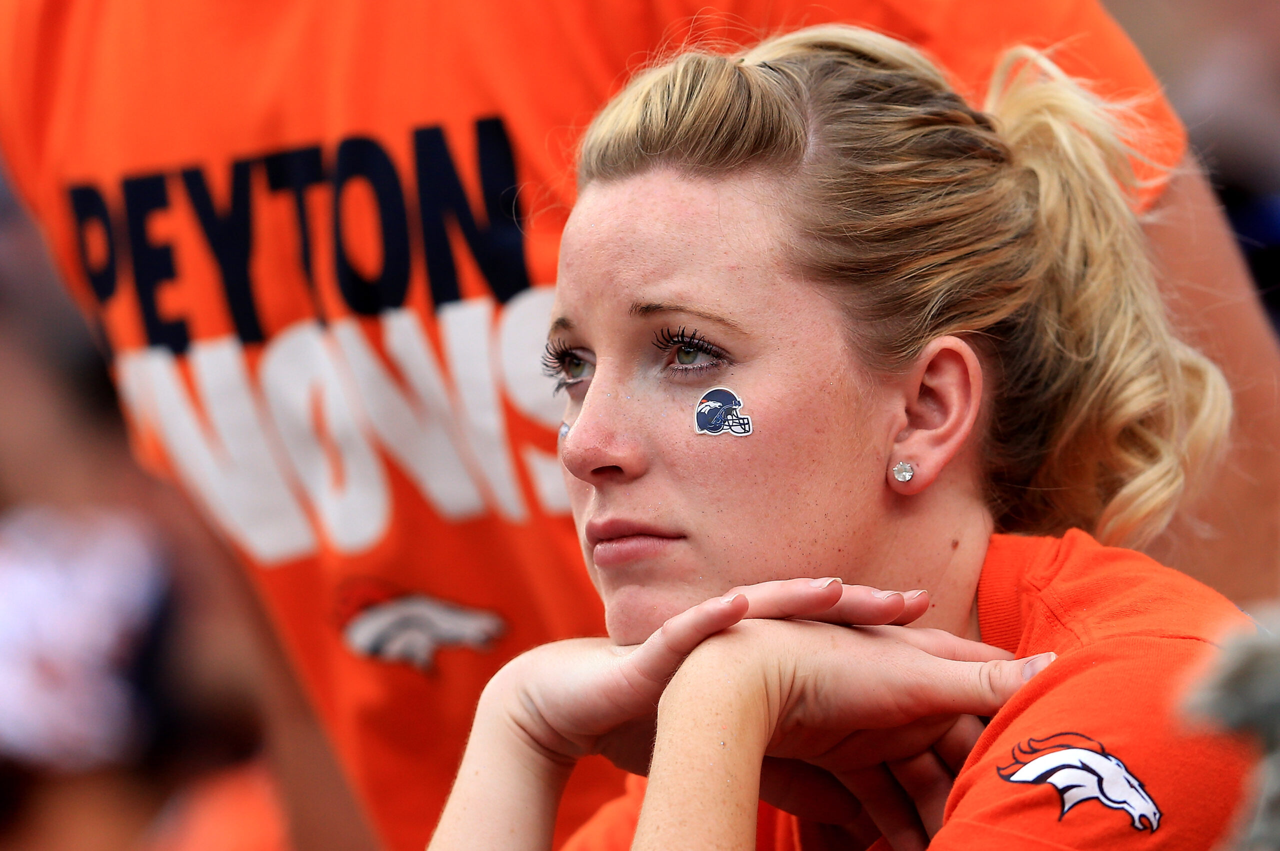 DENVER, CO - SEPTEMBER 23:  A fan of the Denver Broncos looks on as they are defeated by the Housto...