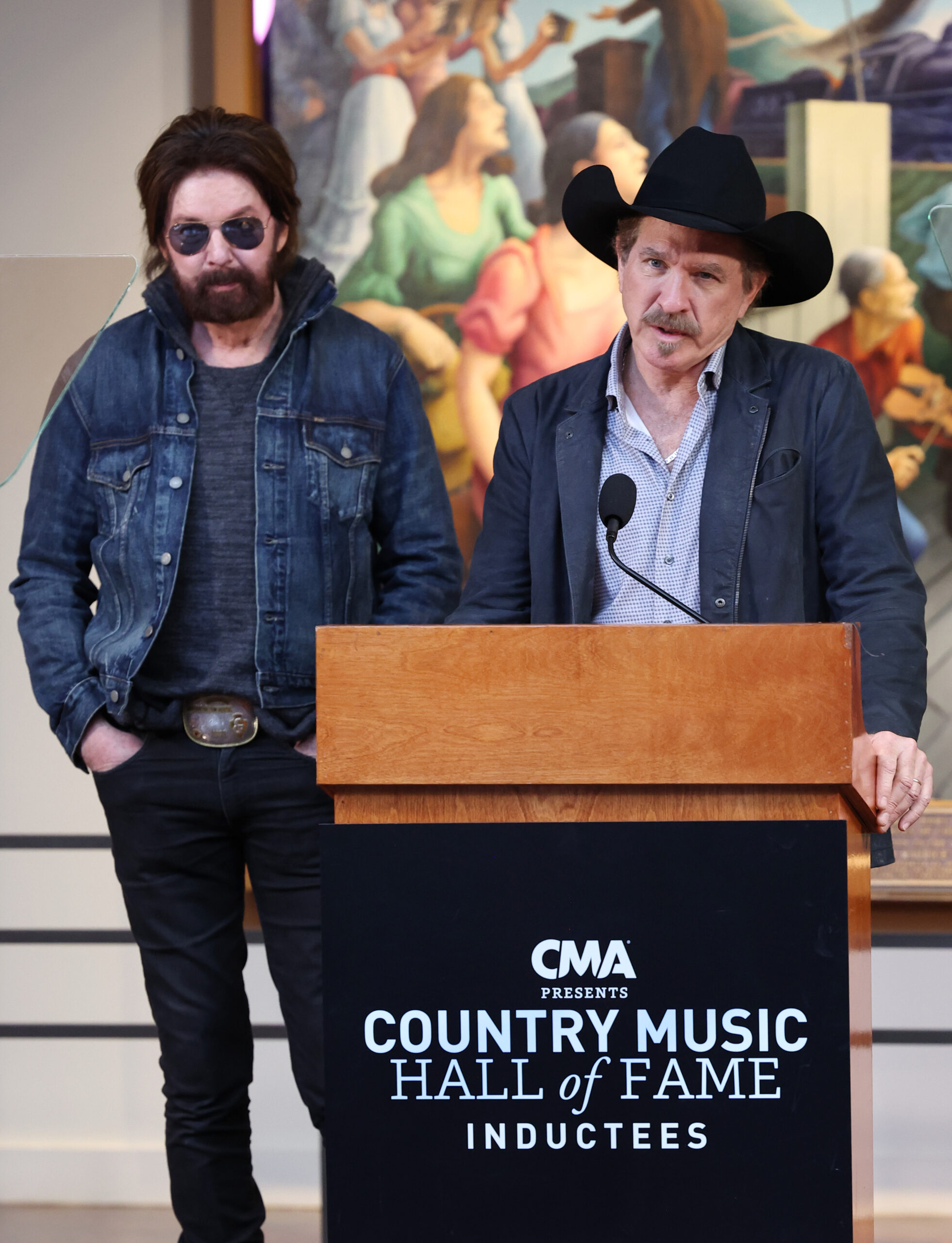 NASHVILLE, TENNESSEE - MARCH 18: (L-R) Ronnie Dunn and Kix Brooks of Brooks & Dunn speak at the...