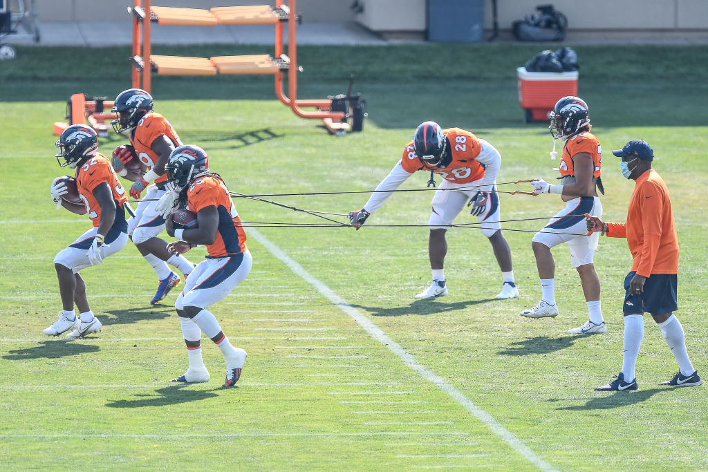 ENGLEWOOD, CO - AUGUST 20:  Denver Broncos running backs, including Melvin Gordon #25, LeVante Bell...