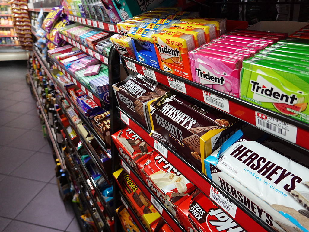 MIAMI, FLORIDA - JULY 23: Hershey products sit on a store shelf on July 23, 2025 in Miami, Florida....