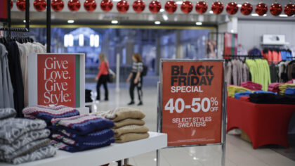 JERSEY CITY, NJ - NOVEMBER 25: Customers visit a Macy's store during Black Friday sales on November...