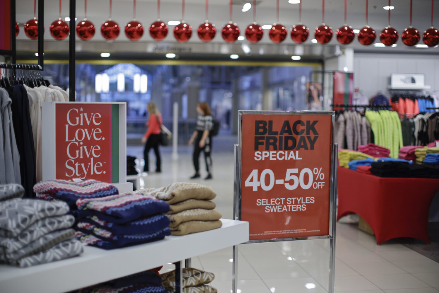 JERSEY CITY, NJ - NOVEMBER 25: Customers visit a Macy's store during Black Friday sales on November...