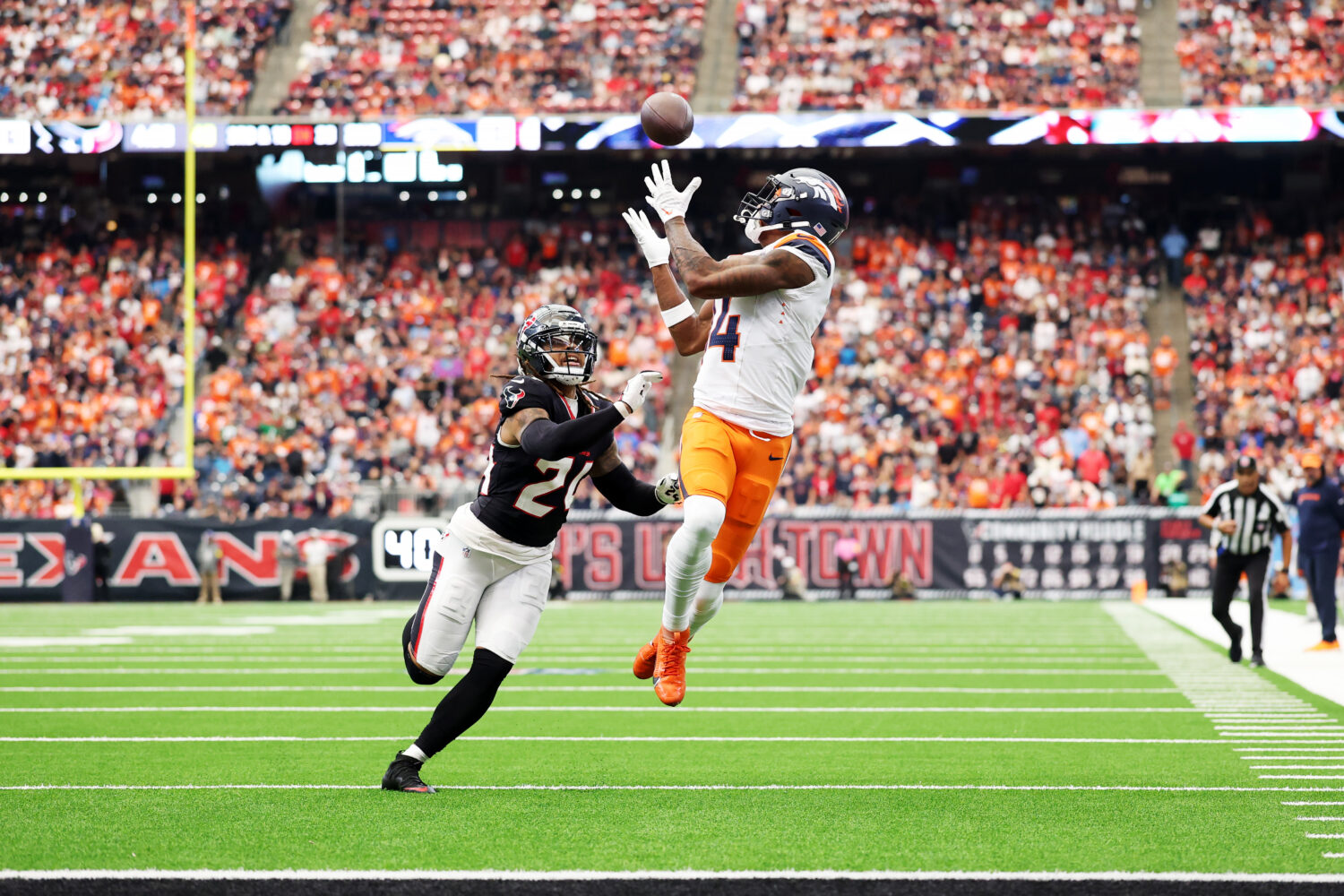 HOUSTON, TEXAS - NOVEMBER 02: Courtland Sutton #14 of the Denver Broncos catches a touchdown pass a...