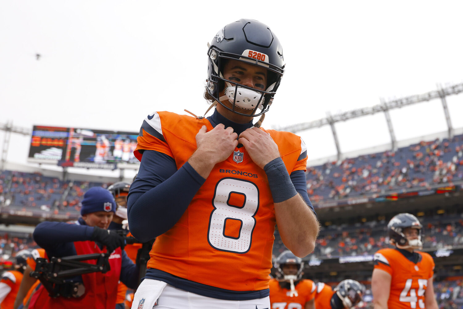 DENVER, COLORADO - JANUARY 25: Jarrett Stidham #8 of the Denver Broncos looks on during pregame int...