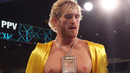 MIAMI GARDENS, FLORIDA - JUNE 06: Logan Paul wears a Charizard Pokemon card chain as he enters the ...