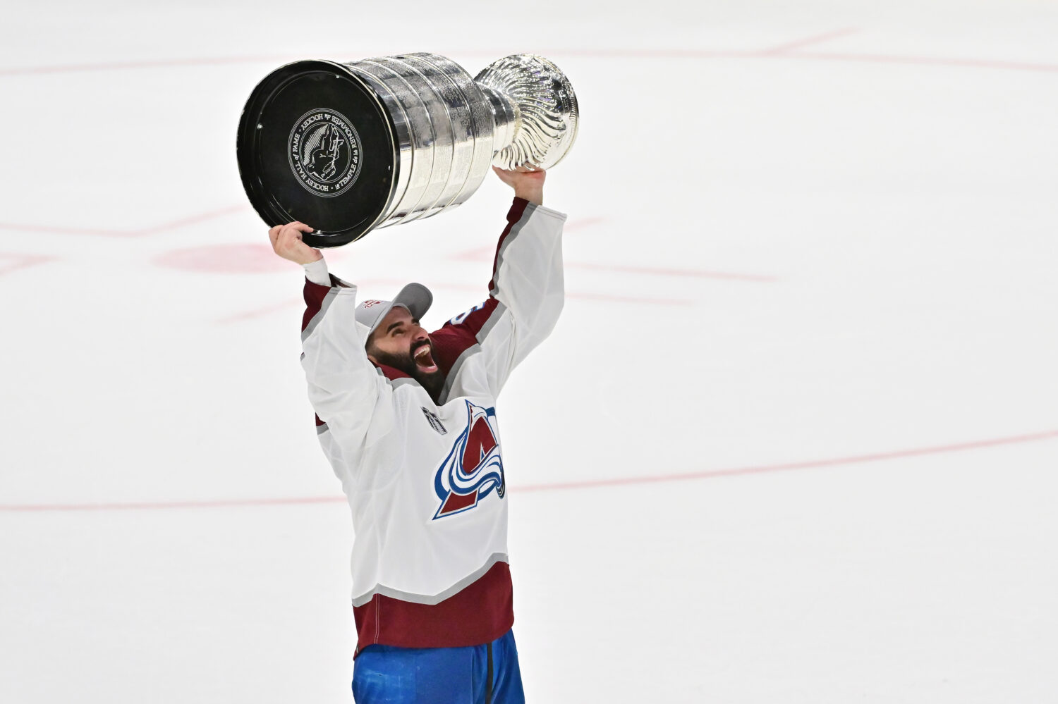 TAMPA, FLORIDA - JUNE 26: Nazem Kadri #91 of the Colorado Avalanche lifts the Stanley Cup after def...