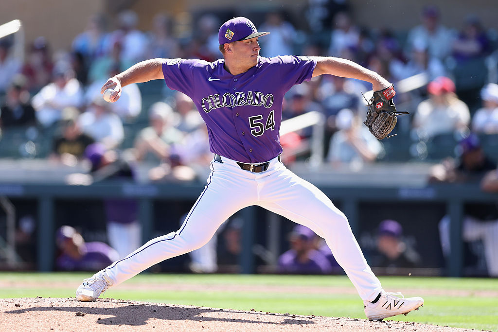SCOTTSDALE, ARIZONA - MARCH 04: Relief pitcher Seth Halvorsen #54 of the Colorado Rockies pitches a...