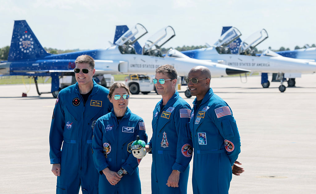 CAPE CANAVERAL, FLORIDA - MARCH 27:  The Artemis II crew – (L-R) mission specialist Jeremy Hansen...