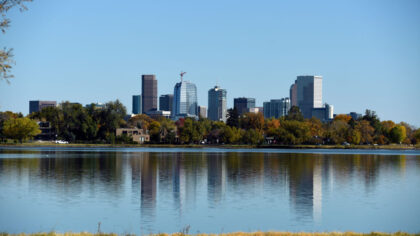 DENVER, CO - MAY 17: Denver Skyline reflected by Sloans Lake on October 17, 2017 photographed from ...