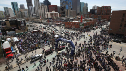 DENVER, CO - APRIL 04:  Fans flood the intersection of Blake Street and 20th Street as they head in...