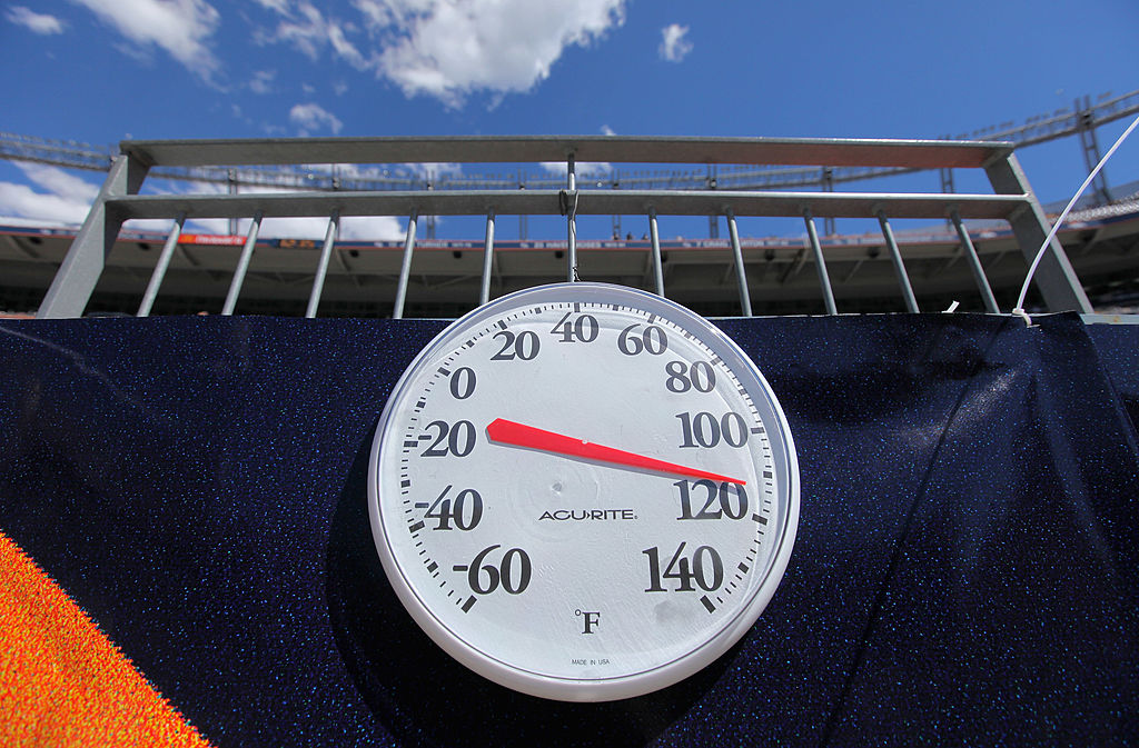 DENVER - SEPTEMBER 04:  A thermometer on the field behind the bench of the Colorado State Rams regi...