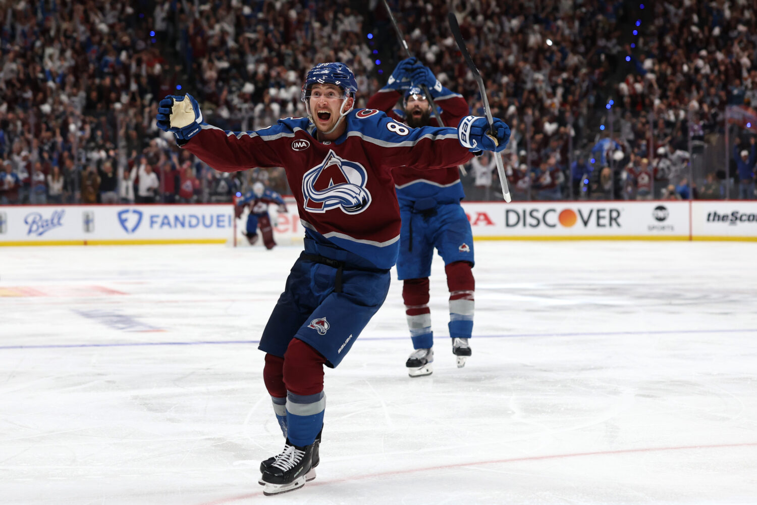 DENVER, COLORADO - MAY 13: Martin Necas #88 of the Colorado Avalanche celebrates the game winning g...