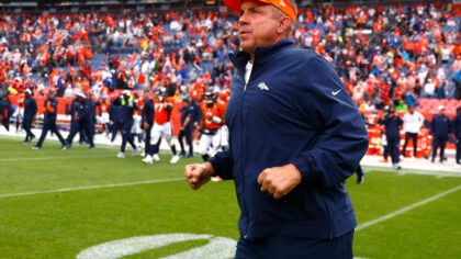DENVER, COLORADO - SEPTEMBER 10: Head coach Sean Payton of the Denver Broncos jogs onto the field a...