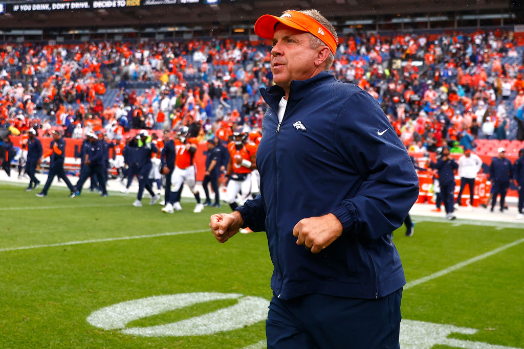 DENVER, COLORADO - SEPTEMBER 10: Head coach Sean Payton of the Denver Broncos jogs onto the field a...