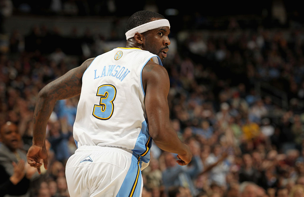 DENVER, CO - MARCH 23:  Ty Lawson #3 of the Denver Nuggets looks on against the San Antonio Spurs a...