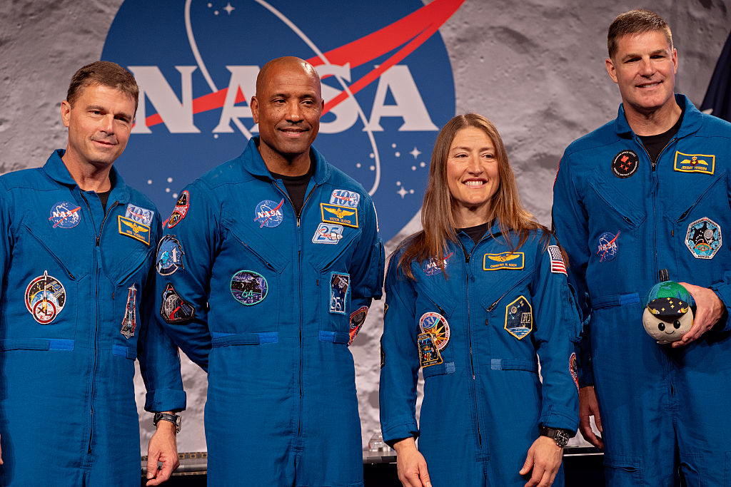 HOUSTON, TEXAS - APRIL 16: Artemis II Commander Reid Wiseman, Pilot Victor Glover, Mission Speciali...