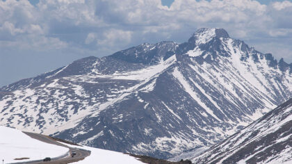 ROCKY MOUNTAIN NATIONAL PARK - MAY 23:  Cars drive down the Trail Ridge Road May 23, 2003 in Rocky ...