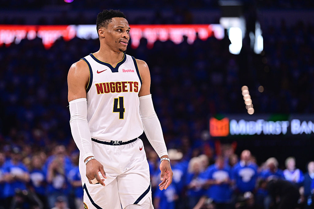 OKLAHOMA CITY, OKLAHOMA - MAY 18: Russell Westbrook #4 of the Denver Nuggets walks down the floor d...