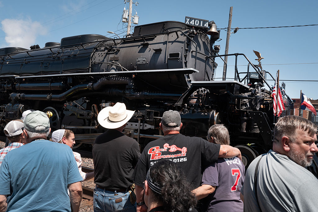 TAMA, IOWA - JUNE 01: People gather along the railroad tracks to watch as Union Pacific’s Big Boy...