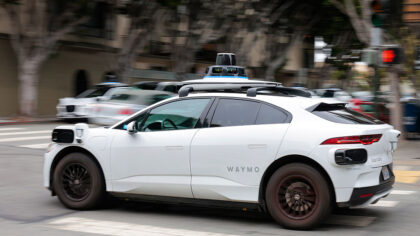 SAN FRANCISCO, CALIFORNIA - JULY 07: A Waymo robotaxi drives in North Beach on July 07, 2026 in San...