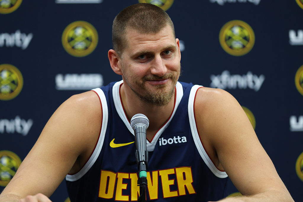 DENVER, CO - SEPTEMBER 28: Nikola Jokic #15 of the Denver Nuggets fields questions during media day...