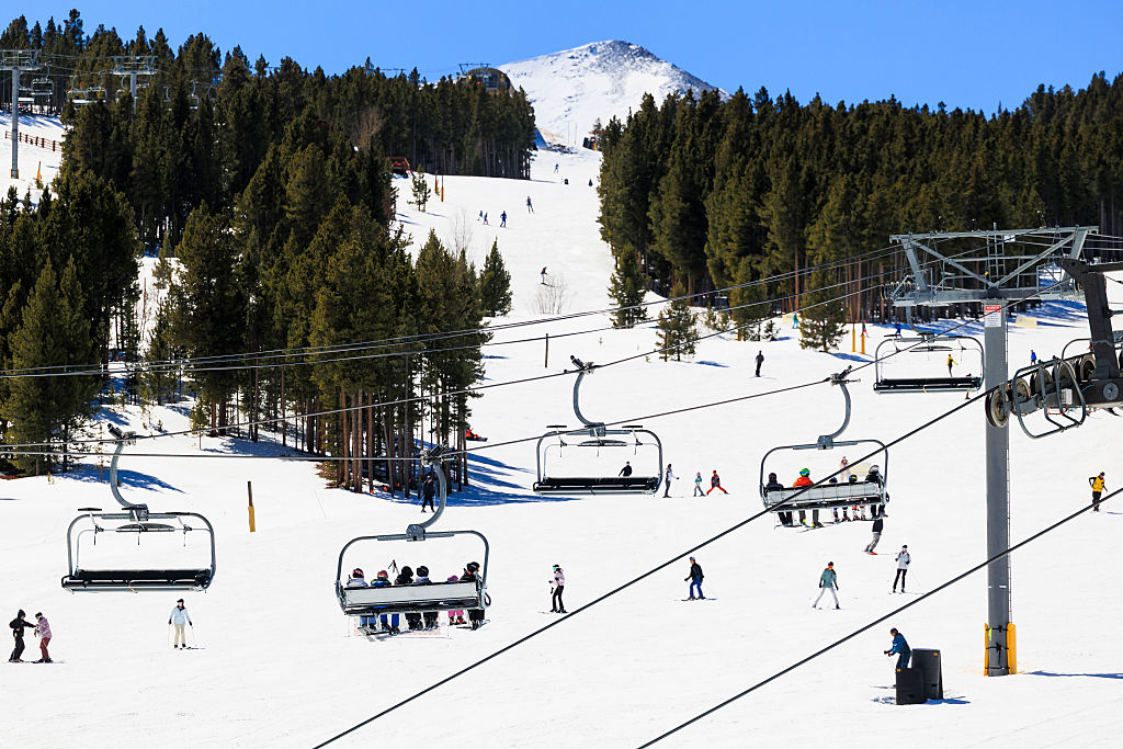 BRECKENRIDGE, COLORADO - MARCH 18: People ski and snowboard at Breckenridge Ski Resort as temperatu...