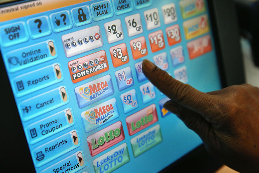 CHICAGO, IL - DECEMBER 17:  A clerk prints a Mega Millions lottery ticket at a convenience store on...