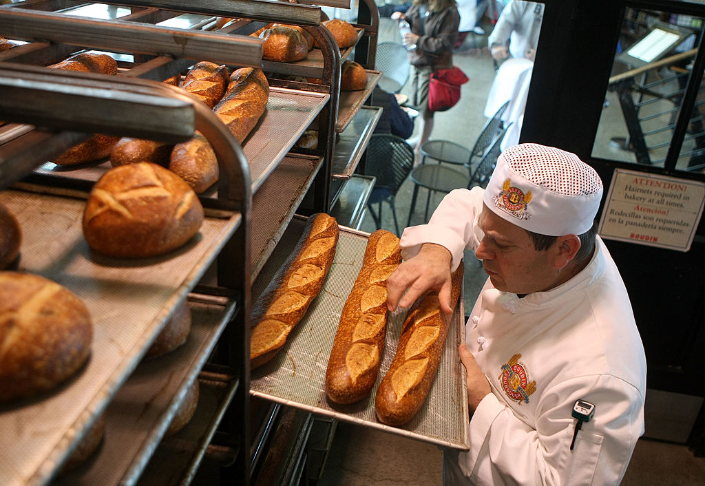 SAN FRANCISCO - APRIL 21:  Boudin Bakery master baker Fernando Padilla checks loaves of freshly bak...